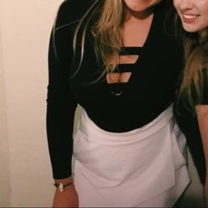 Strappy black long-sleeve bodysuit